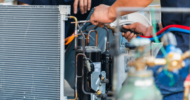 HVAC technician servicing a furnace in Salt Lake City